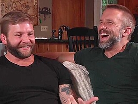 Two Cheerful Bears Making Out On A Couch